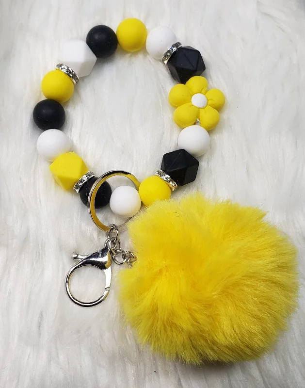 yellow with pom pom