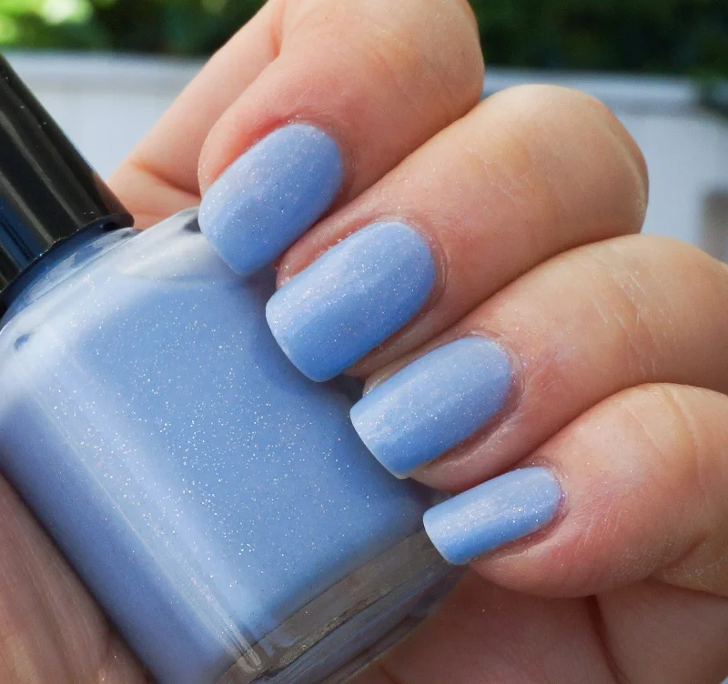 nail polish chalet cozy-Little Fluffy Clouds - light blue w/ glass fleck shimmer