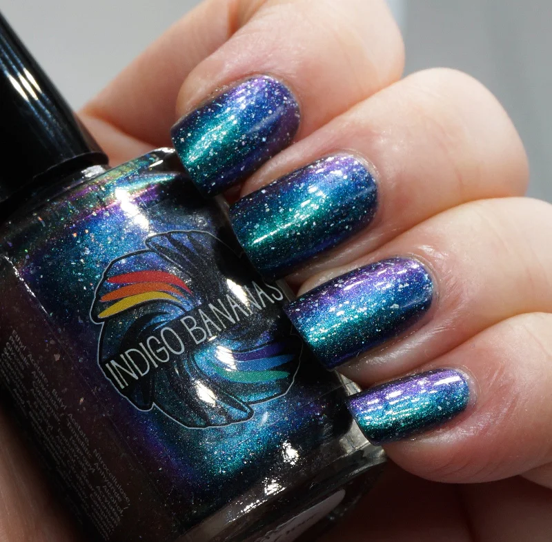 nail polish cricket song-Nature of Your Reality - teal/bright green-blue multichrome linear holographic w/ flakies