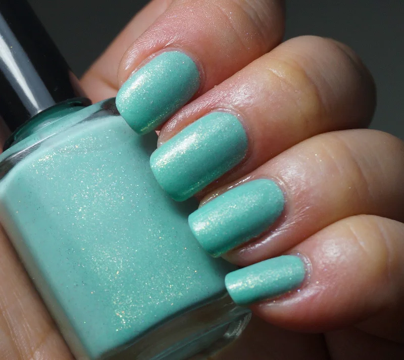 nail polish puck slap-Land of Green Ginger - mint green w/ glass fleck shimmer