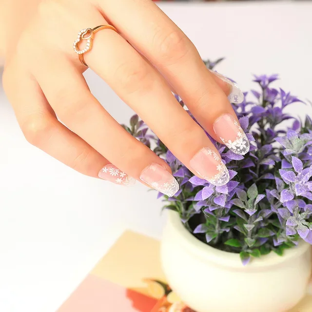 nail repair with high-shine gel-White Flowers French Manicure with Side Design and Clear Background