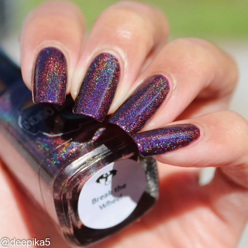 nail polish light beam-Break the Wheel - dark burgundy / blackened cherry linear holographic